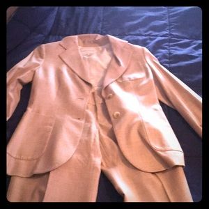 Woman’s tan suit